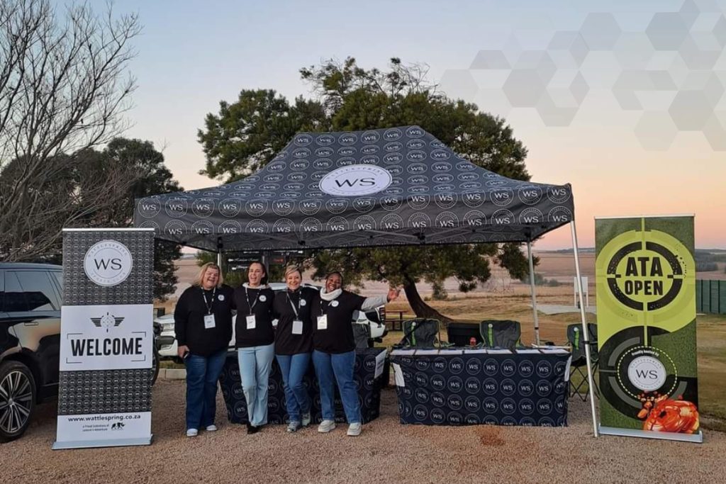 Complete event branding kit with custom gazebo, pull-up banners, tablecloth, branded apparel and lanyards by Merakology Creative Studio